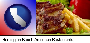 Huntington Beach, California - an American restaurant entree (back ribs and french fries)