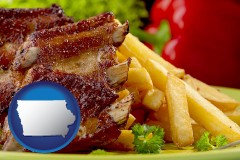 iowa map icon and an American restaurant entree (back ribs and french fries)