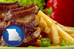 missouri map icon and an American restaurant entree (back ribs and french fries)