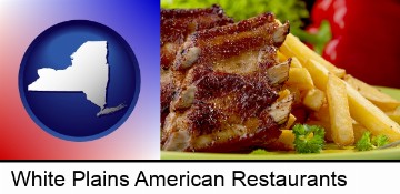 an American restaurant entree (back ribs and french fries) in White Plains, NY